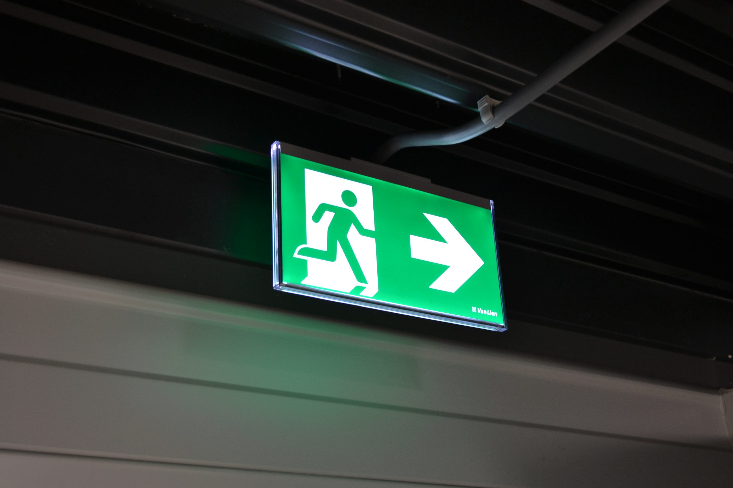 Illuminated emergency exit sign