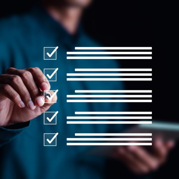 Performance checklist, businessman using checklist survey, filling out digital form checklist, take an assessment, questionnaire, evaluation, online survey, online exam.;
