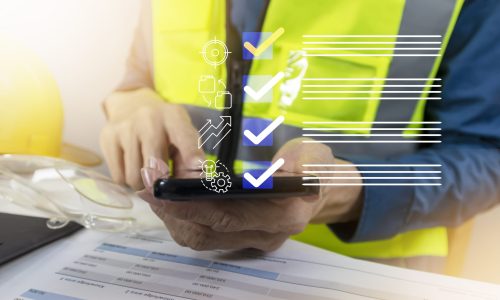 Engineers check the checklist for correctness of production parts and ongoing projects