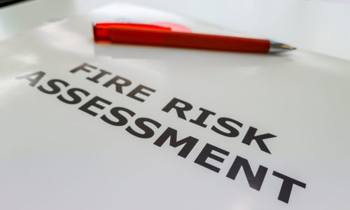 A file containing the Fire Risk Assessment, a legal requirement in the UK to assess and reduce the rise of fire for commercial properties, blocks of flats and workplaces.